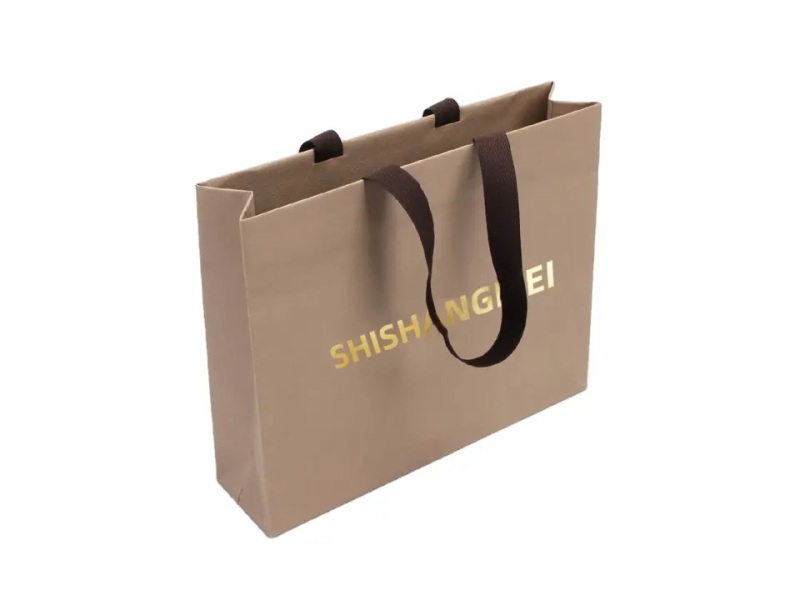 Artisanat personnalisé gris bijoux réutilisables cadeau cosmétique magasin de vêtements shopping cadeau sac en papier kraft sac fourre-tout avec logo pour emballage avec poignées en ruban