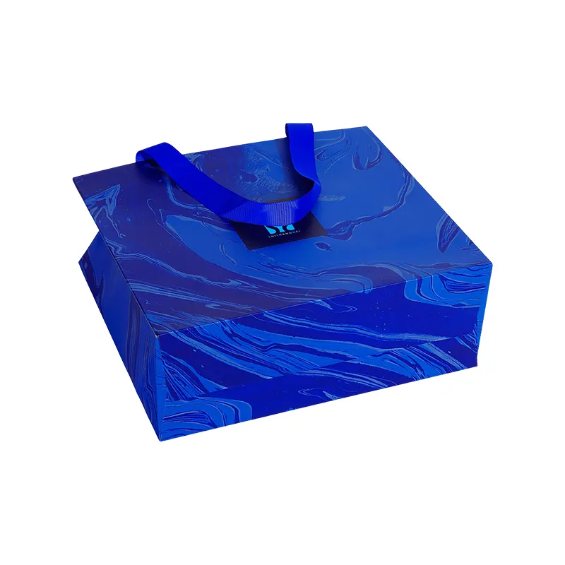 Cadeau de magasinage de boutique de détail bleu marine de luxe personnalisé portant un sac en papier avec votre propre poignée de ruban de logo pour l'emballage cadeau