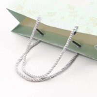 Emballage personnalisé recyclable cadeau de la Saint-Valentin bijoux holographique rouleau eco poubelle sac en papier avec logo personnalisé imprimé