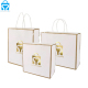 Direct sales wholesale price bouquet flower carrier gift white custom paper kraft bags takeaway for clothing with handle