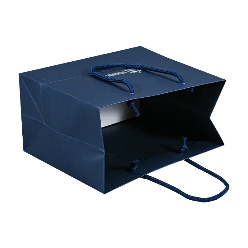 Yeniden kullanılabilir lüks metalik folyo damgalama promosyon lacivert takı ambalaj alışveriş kağıt hediye keseleri