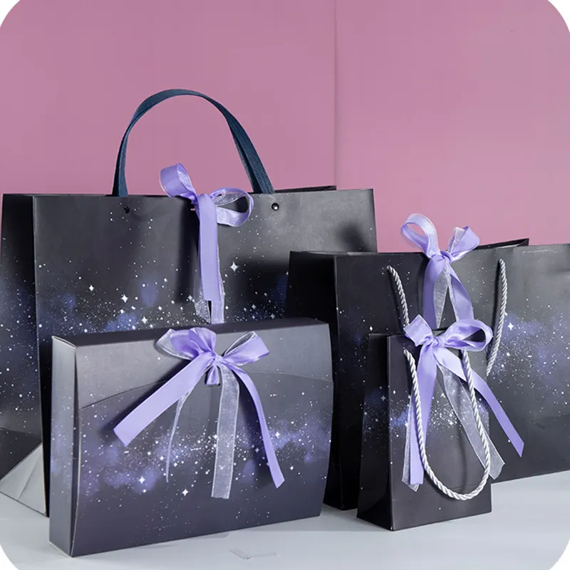 Wholesale custom print luxury jewelry purple shopping paper carry bag with ribbon bow handles logo printed gift bag packaging