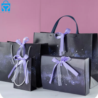 Wholesale custom print luxury jewelry purple shopping paper carry bag with ribbon bow handles logo printed gift bag packaging