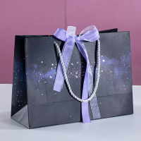 Wholesale custom print luxury jewelry purple shopping paper carry bag with ribbon bow handles logo printed gift bag packaging