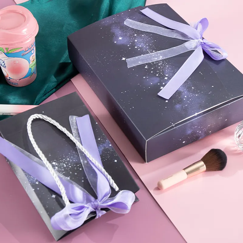 Wholesale custom print luxury jewelry purple shopping paper carry bag with ribbon bow handles logo printed gift bag packaging