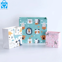 Luxury craft custom logo jewelry gift paper bag for clothes blue matte garment clothing boutique packaging bags with ribbon bow