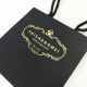 Diseño personalizado, bolsa de embalaje de ramo de flores de lámina de oro rosa, bolsa de papel kraft negro, bolsa de regalo de papel artesanal cuadrada inferior, venta al por mayor