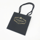 Diseño personalizado, bolsa de embalaje de ramo de flores de lámina de oro rosa, bolsa de papel kraft negro, bolsa de regalo de papel artesanal cuadrada inferior, venta al por mayor