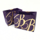 Grandi sacchetti regalo eleganti viola stampati di lusso per lo shopping di indumenti sacchetti di carta patinata base larga