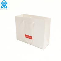 Personnalisé blanc luxe shopping bijoux fourre-tout cadeau premium art carton papier sacs emballage beauté cadeau sac avec logo imprimé