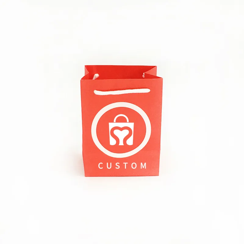 Sac rouge avec logo imprimé pas cher prix petite taille cosmétiques parfum bijoux sac à provisions en papier avec logo personnalisé sacs-cadeaux noël