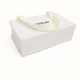 Bolsa de papel de compras con logotipo, joyería de perfume artesanal blanca personalizada, regalo cosmético, ropa