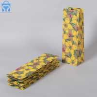 Luxury laminatio christmas wine bottle bag insulated in box flower bouquet paper packaging gift cover bags for travel bouquets