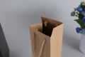 Blumenstrauß-Wein-Einkaufstasche, recycelte Kraftpapier-Verpackungspapiertüte