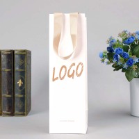 Sacs en papier cadeau fourre-tout en fleur de liqueur de vin laminé blanc