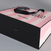 Eco recyclable jetable de haute qualité papeterie personnalisée sac cadeau en papier dur logo personnalisé vêtements chaussures shopping sac en papier