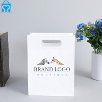 Eco recyclable europe promotional custom logo die cut handle white clothing gift paper shopping bag with your own logo