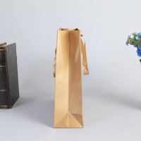 Recyclable High end soft lamination embross logo luxury product brown craft small shopping paper gift bags ribbon handles