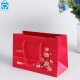 Sacchetto di carta rosso di lusso personalizzato lamina d'oro fantasia carta d'arte shopping al dettaglio boutique sottile sacchetti di carta regalo confezione con il proprio logo
