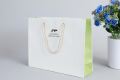 Craft paper bag coco kids party printing twisted rope handlefor shopping packaging