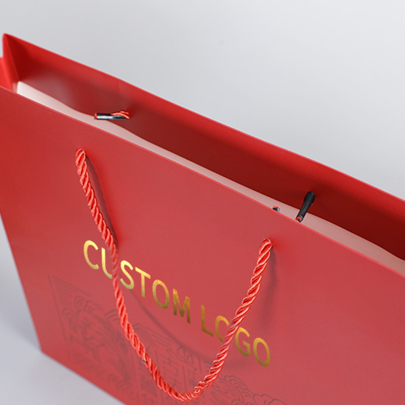 Bijoux de vêtements petit cadeau parfum emballage shopping sac en papier avec logo poignées