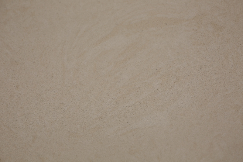 Lobby in marmo ingegnerizzato con venature beige