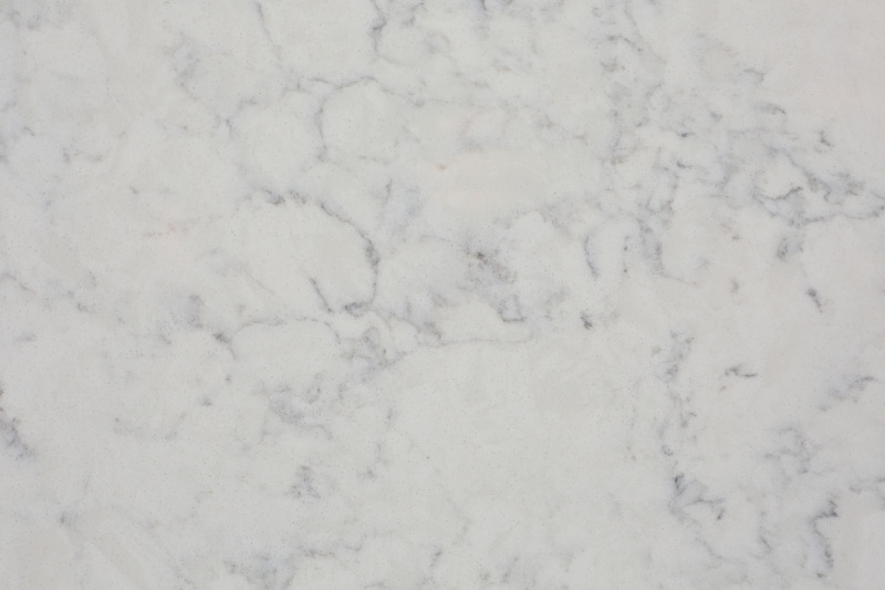 黒い静脈と斑点のある神秘的なアースベースのクォーツキッチンカウンタートップ