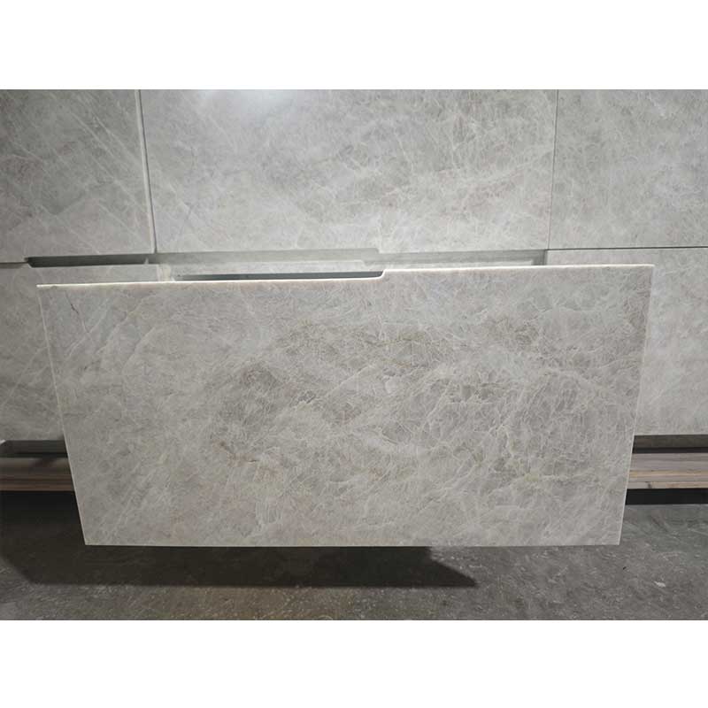 custom stone cabinet door and drawer front