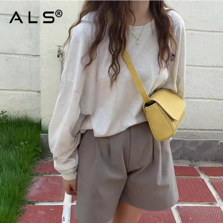 Bolso bandolera de piel para mujer.