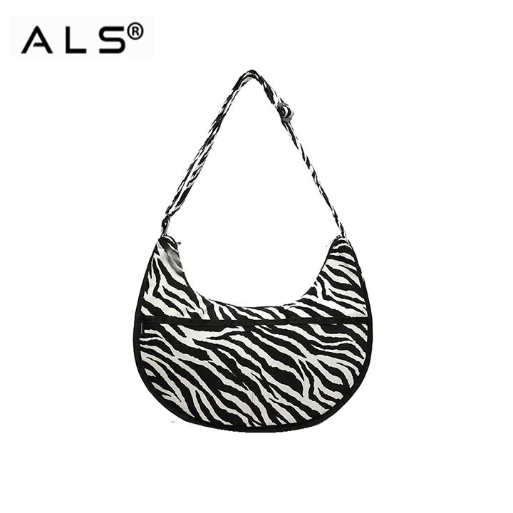 Bolso bandolera de piel para mujer.