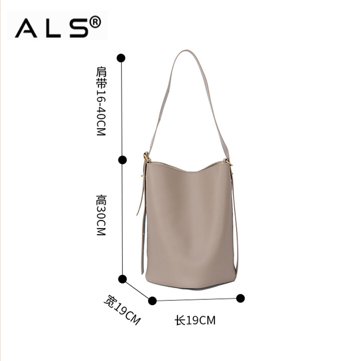 Bolso tipo bombonera de piel con asa de hombro