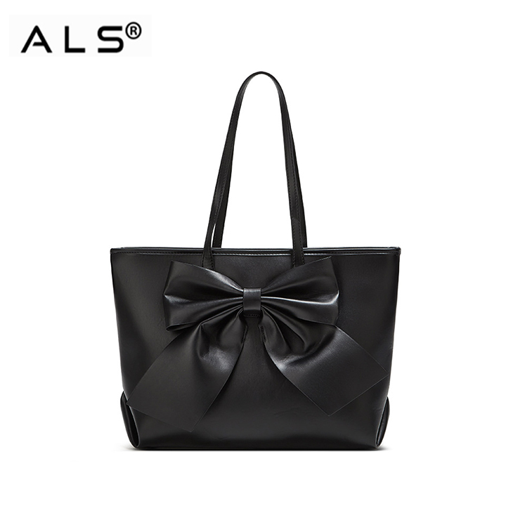 Bolsa de mano con diseño de lazo