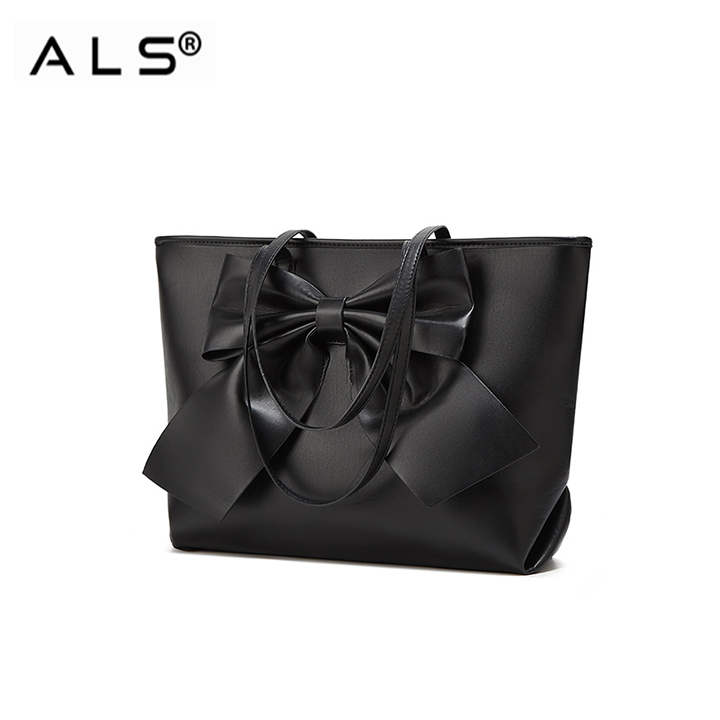 Bolsa de mano con diseño de lazo