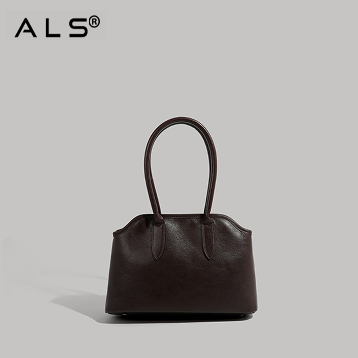 Bolso de hombro de piel bordada