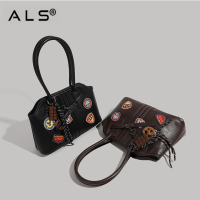 Embroidered leather shoulder bag