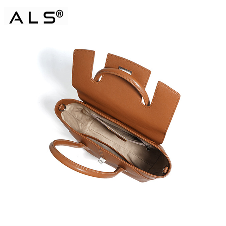 Elegante bolso tote de piel marrón con correa desmontable