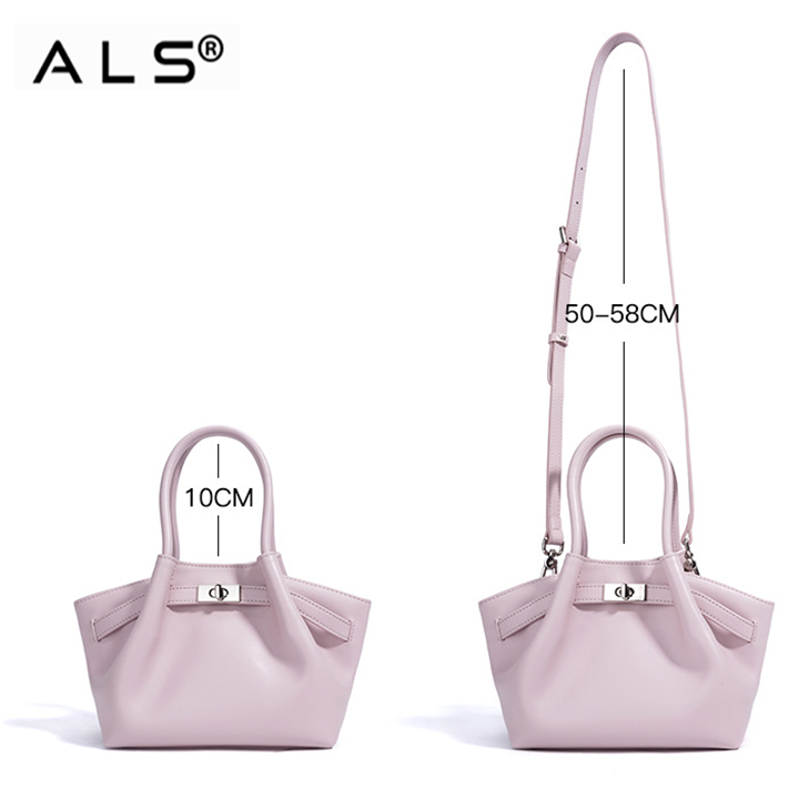 Adorable bolso de mano de piel color morado claro con detalles metálicos