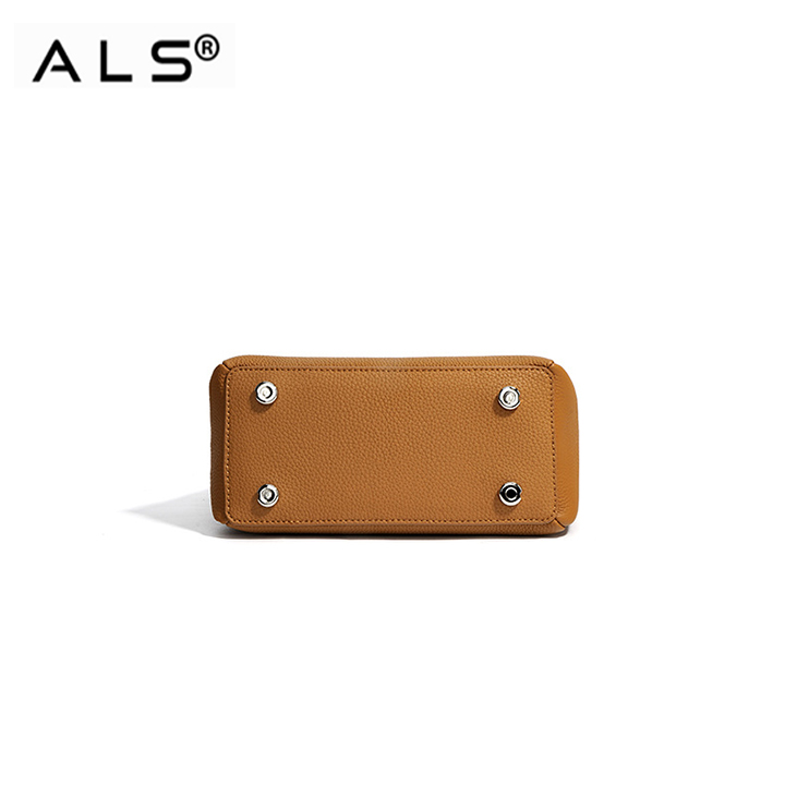 Bolso de mano de cuero con correa ajustable