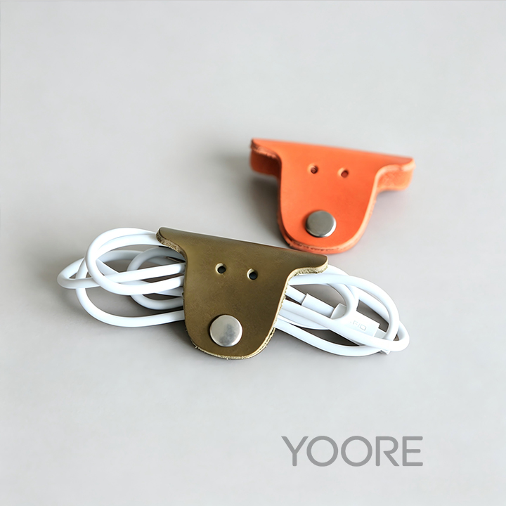 Mini organizador de cables de cuero con botón a presión, soporte portátil para guardar cables de auriculares.