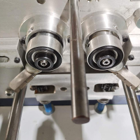 Înfășurător automat de bobină cu fitil pentru lumânări