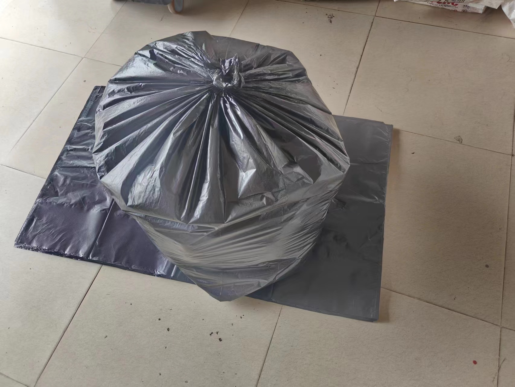 Drawstring garbage bag