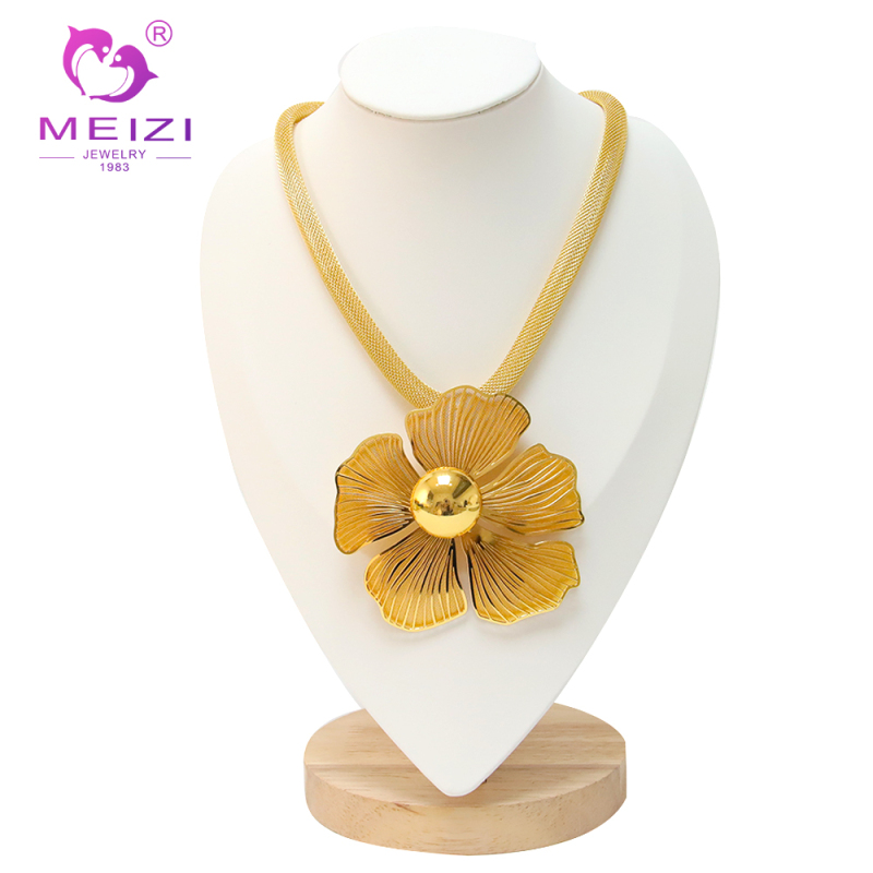 women's gold pendant set necklace and earring set