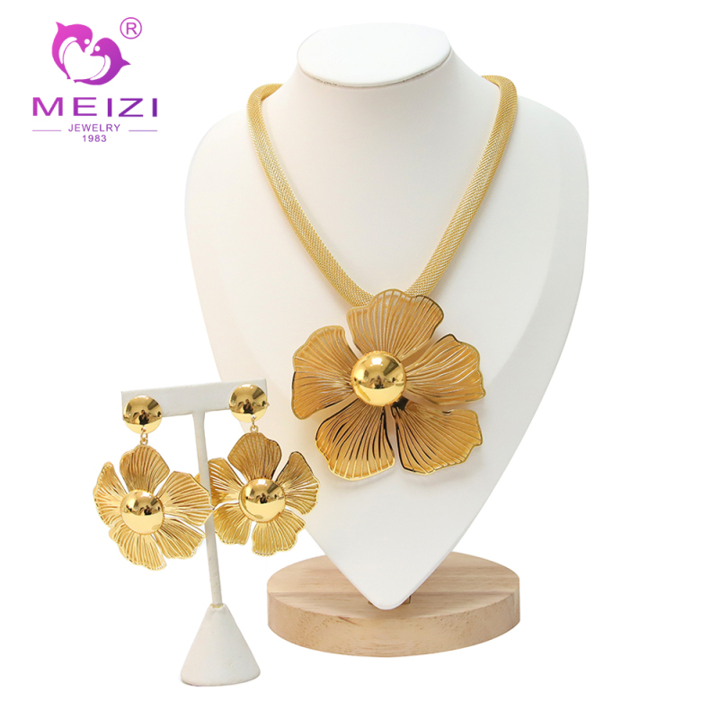 women's gold pendant set necklace and earring set