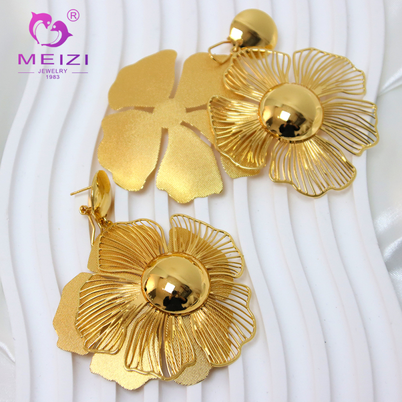 women's gold pendant set necklace and earring set