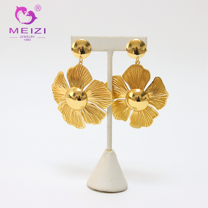 women's gold pendant set necklace and earring set