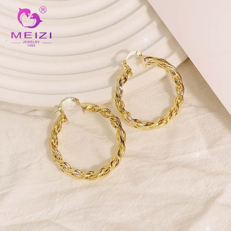 Pendientes de aro de oro de 18 quilates con diamantes para mujer.