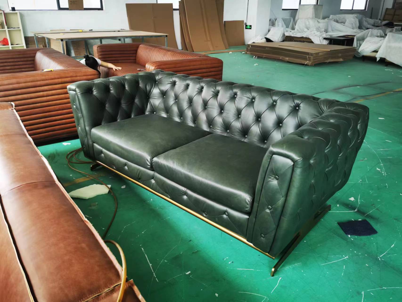 green chesterfield sofa