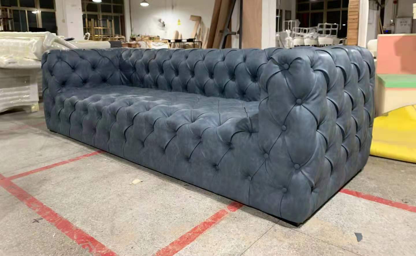 green leather chesterfield sofa