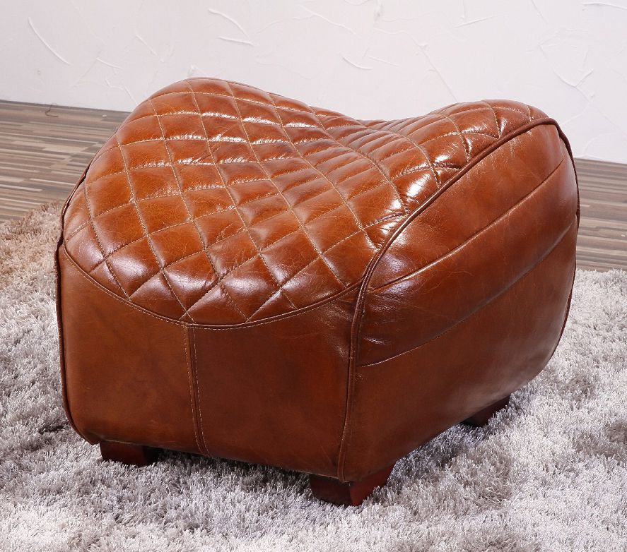 saddle armchair with footstool