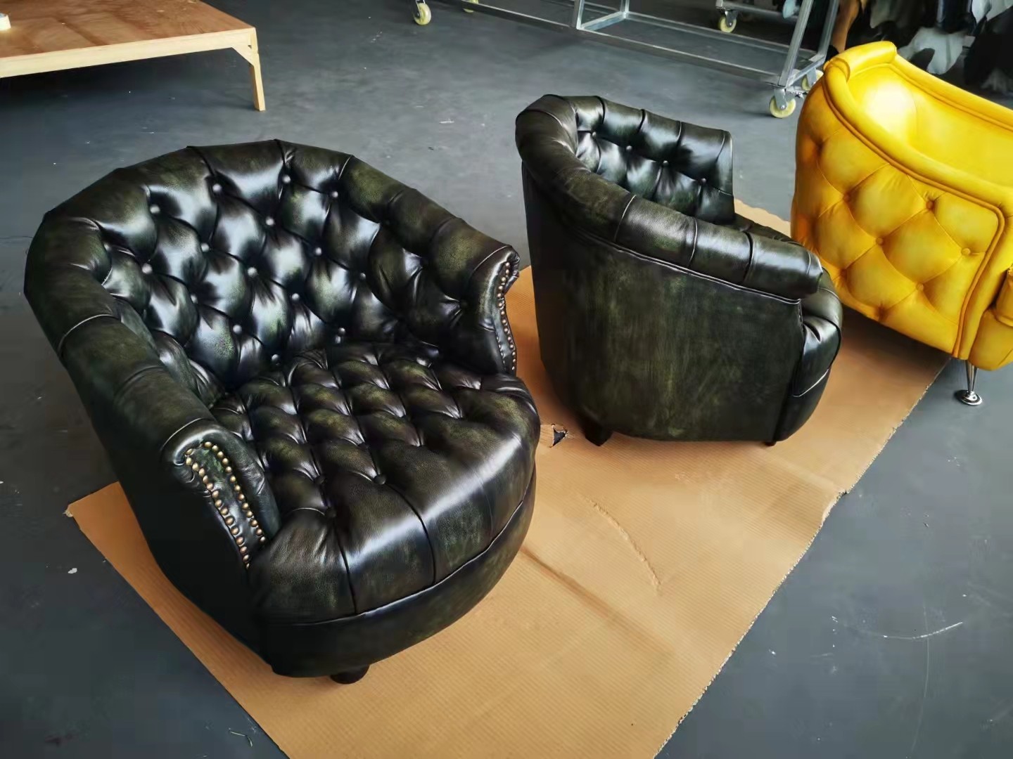 green leather chesterfield chair